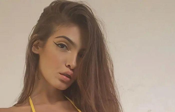 The busty porn model undresses for every Brazilian goal
